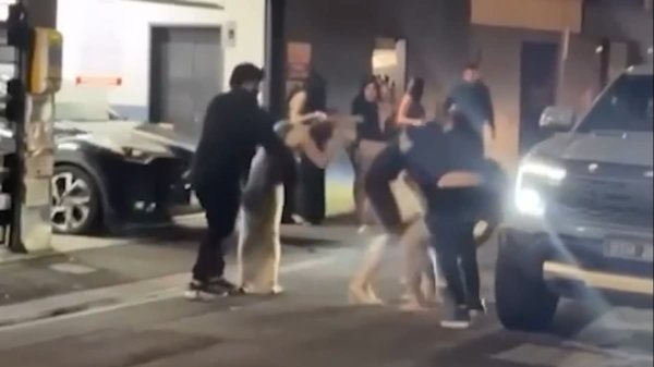 Wild moment late-night brawl erupts in Melbourne's CBD